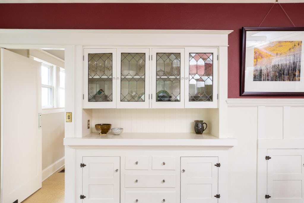 Original dining room built in with leaded pane class cabinets