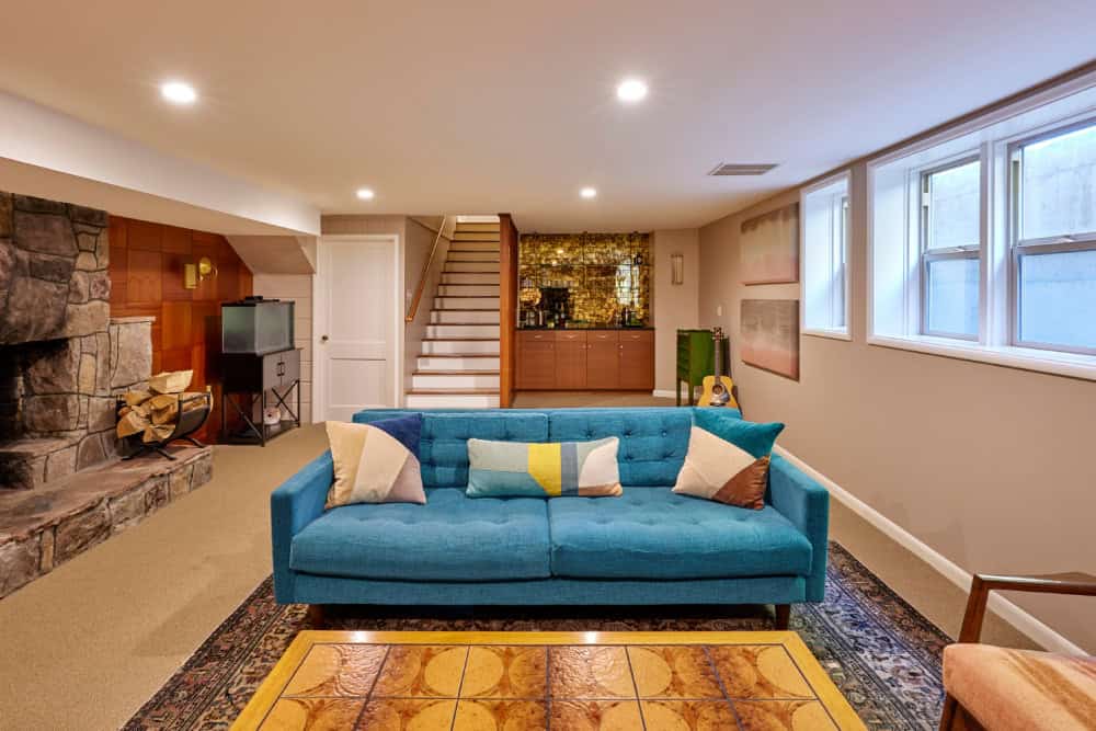 Basement remodel with recessed lighting, family room, and dry bar.